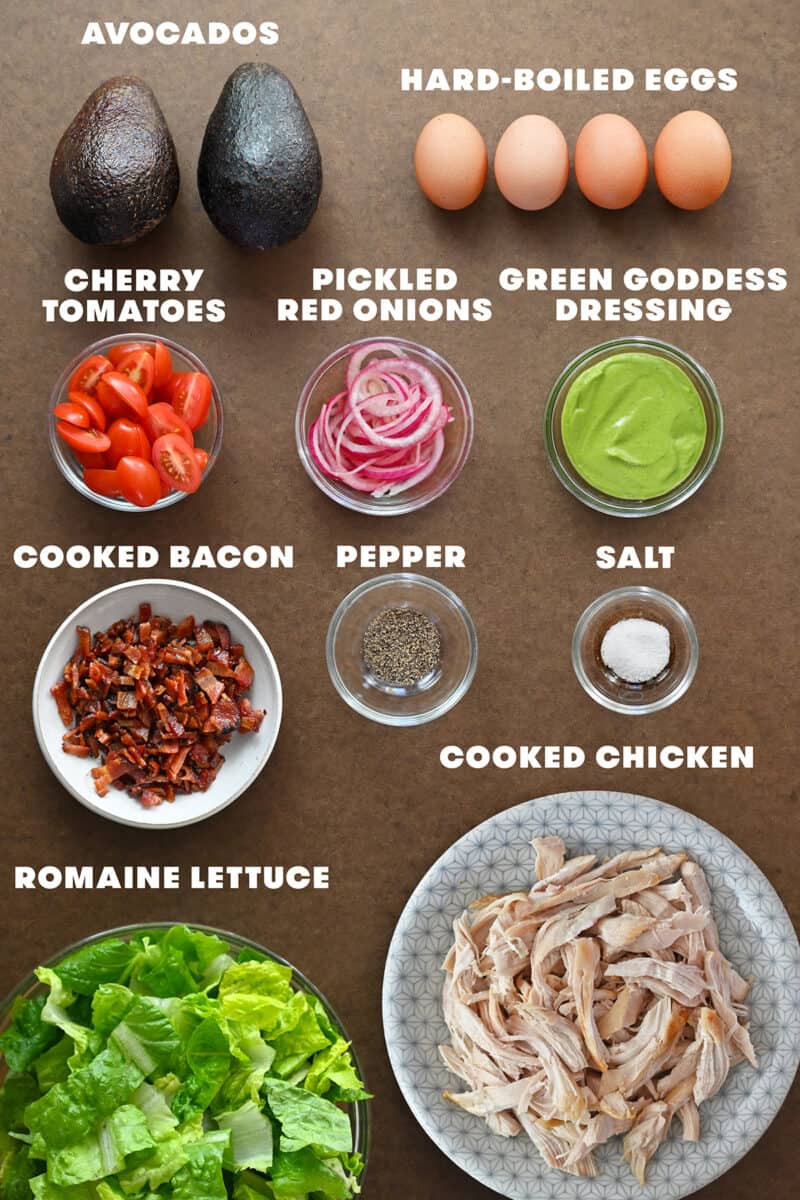 An overhead shot of the raw ingredients to make Green Goddess Cobb Salad, a Panera copycat recipe.