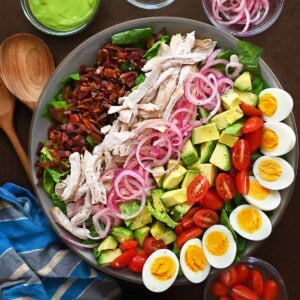 An overhead shot of a paleo and Whole30 Green Goddess Cobb Salad Panera copycat.