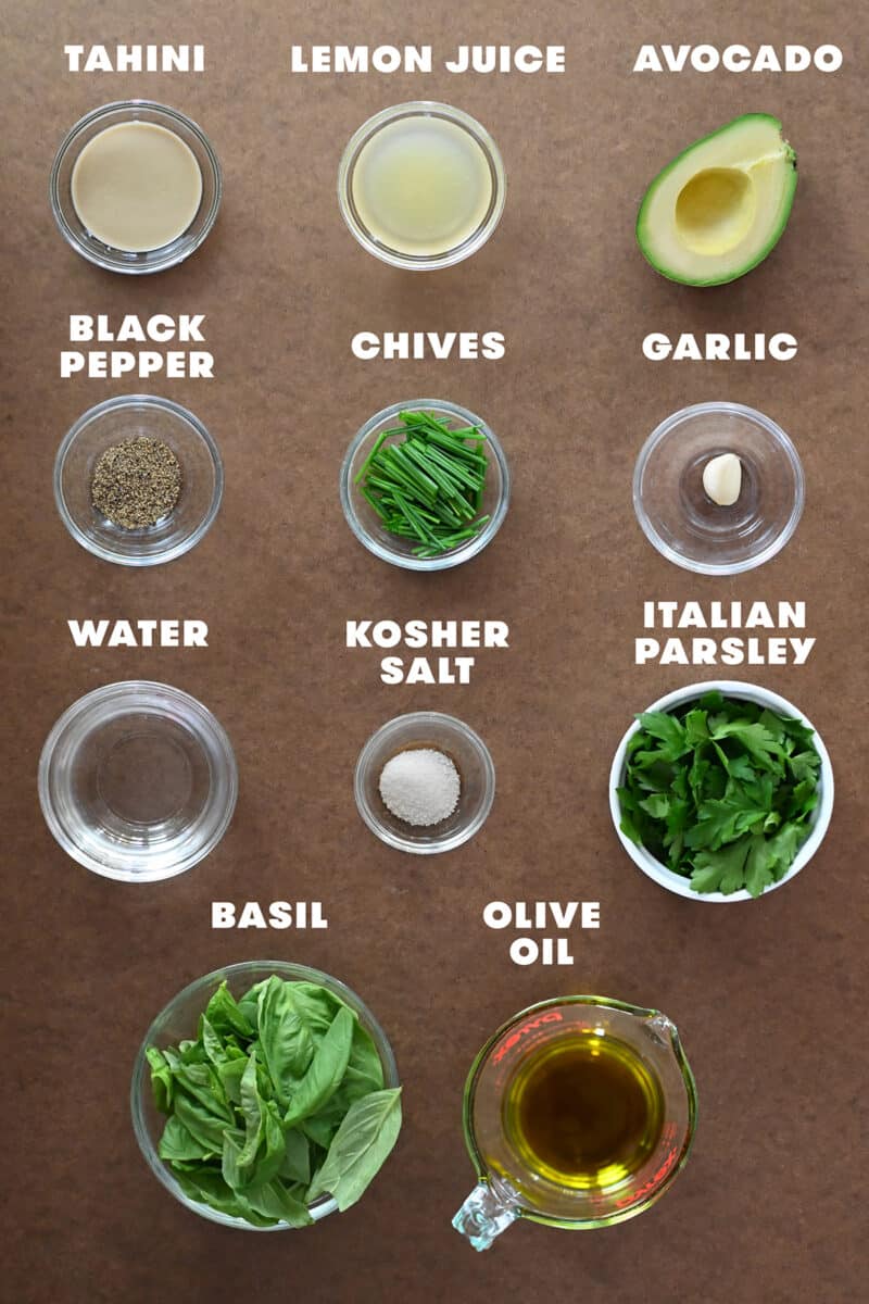 An overhead shot of the raw ingredients to make paleo, dairy-free, vegan, and Whole30 Green Goddess Dressing.
