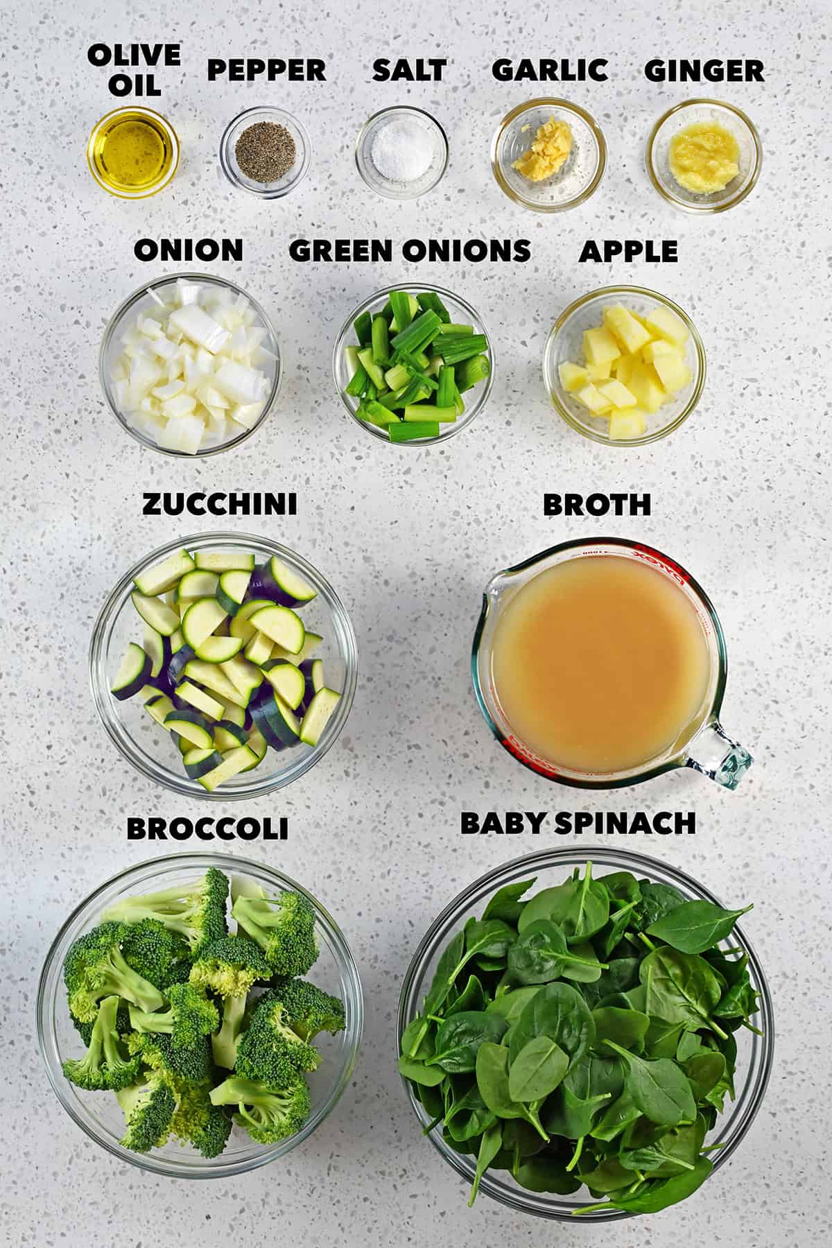 An overhead shot of the raw ingredients to make green soup.