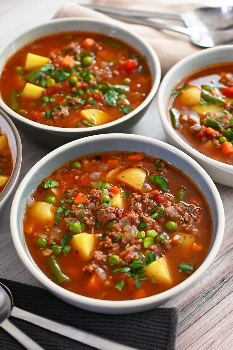 An overhead shot of two bowls of paleo and Whole30 hamburger soup.