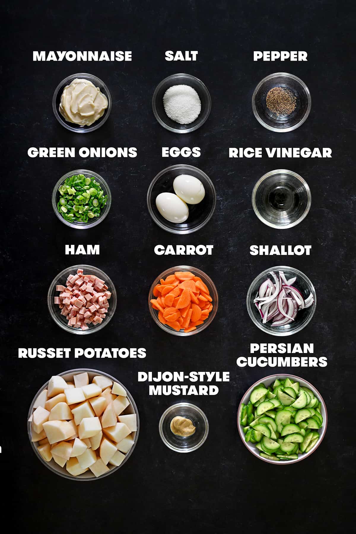 An overhead shot of the raw ingredients for Japanese potato salad.