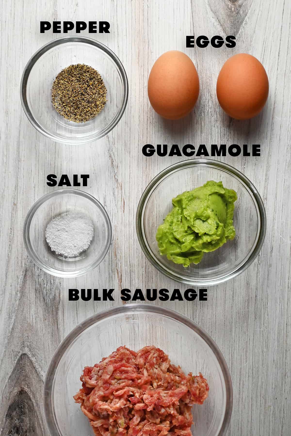 An overhead labelled shot of the raw ingredients to make a paleo egg McMuffin.