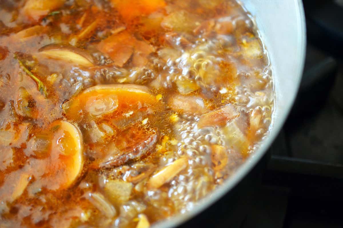 Simmering gluten free umami gravy before it is blended together into a silky smooth gravy.