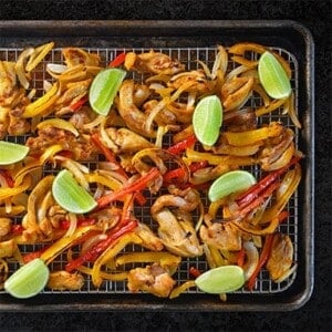 Sheet Pan Chicken Fajitas + Avocado Crema by Michelle Tam https://nomnompaleo.com