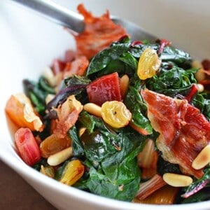 Swiss Chard with Raisins, Pine Nuts, and Porkitos by Michelle Tam / Nom Nom Paleo https://nomnompaleo.com