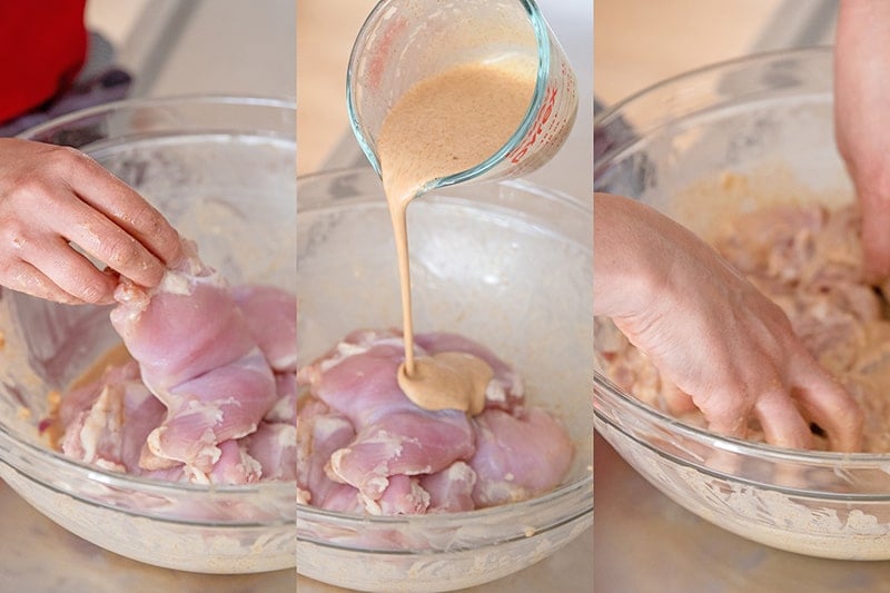 Pouring keto tandoori marinade on boneless skinless chicken thighs and tossing them well.