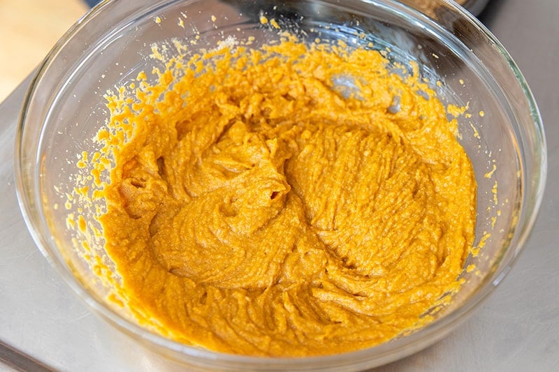 The paleo almond flour pumpkin muffin batter ready to be scooped into the muffin tin.