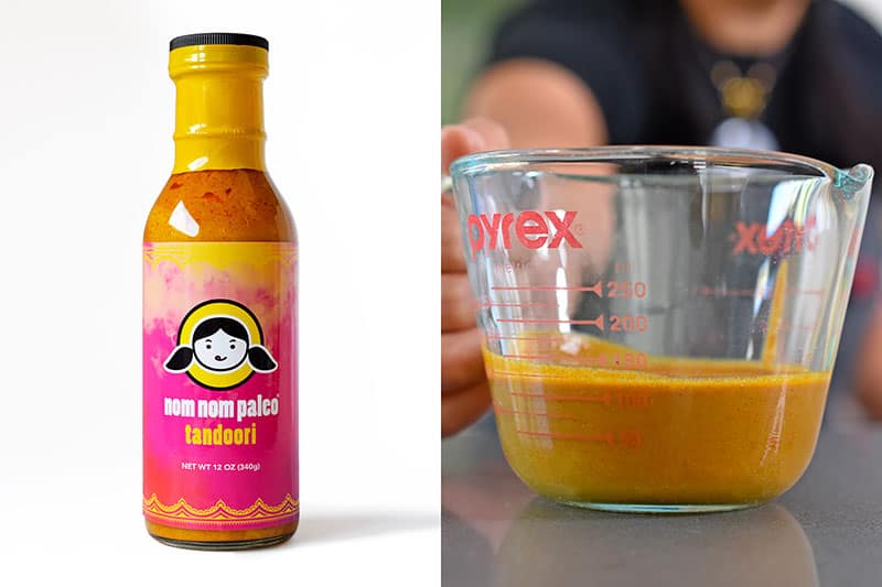 A shot of Nom Nom Paleo Tandoori Marinade available at select Whole Foods Market stores and 1/2 cup of marinade in a measuring cup.