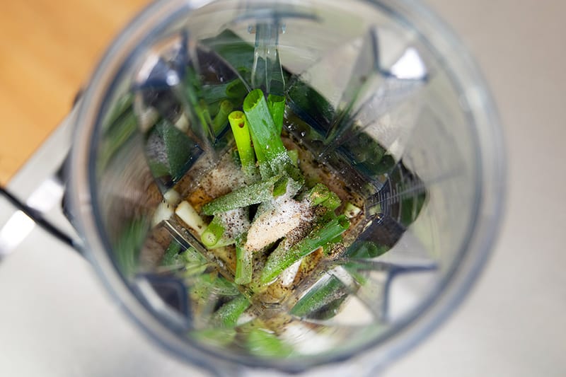 An overhead shot of the Asian Chicken marinade ingredients in an open Vitamix blender.