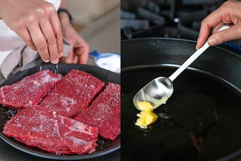 Seasoning a cut up flank steak with salt. Adding ghee to a hot cast iron skillet.