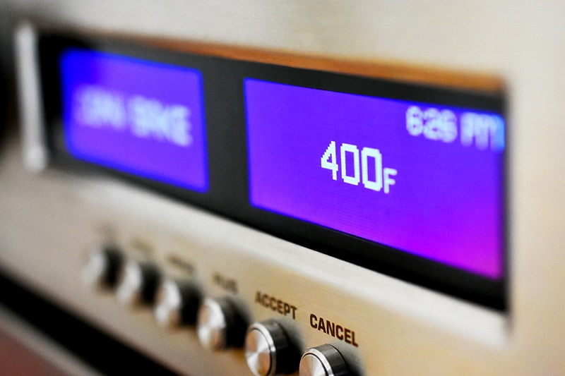 A closeup shot of a wall oven display that shows 400 F as the temperature.