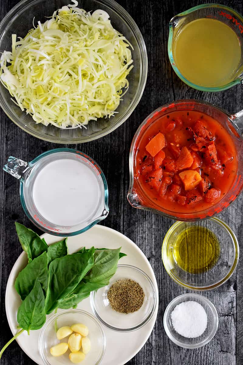 An overhead shot of the raw ingredient to make cream of tomato soup