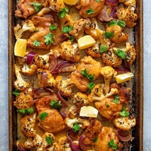 An overhead shot of healthy and easy sheet pan Chicken tandoori, a Whole30 and keto-friendly dinner!