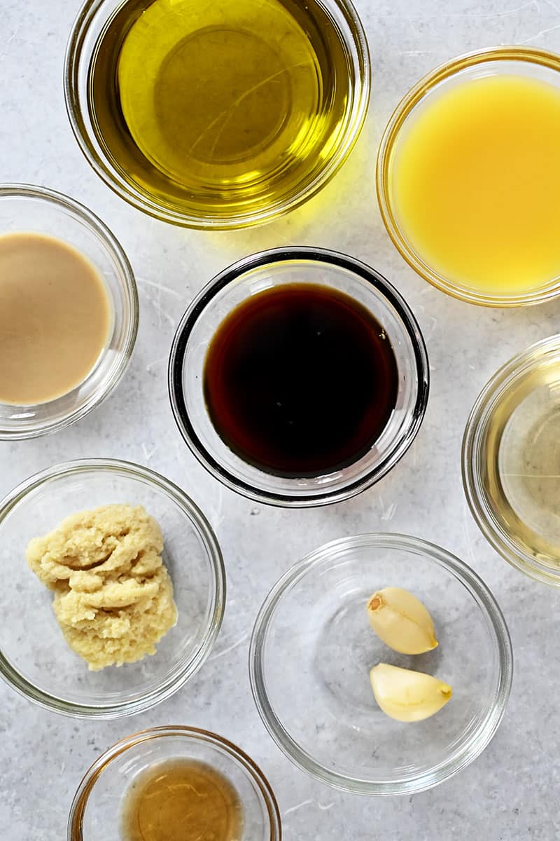 An overhead shot of the raw ingredients for sesame ginger dressing.