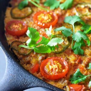 A closeup shot of Tex-Mex Beef and Rice Casserole, a Whole30-friendly one pan meal that you can make in a cast iron skillet.
