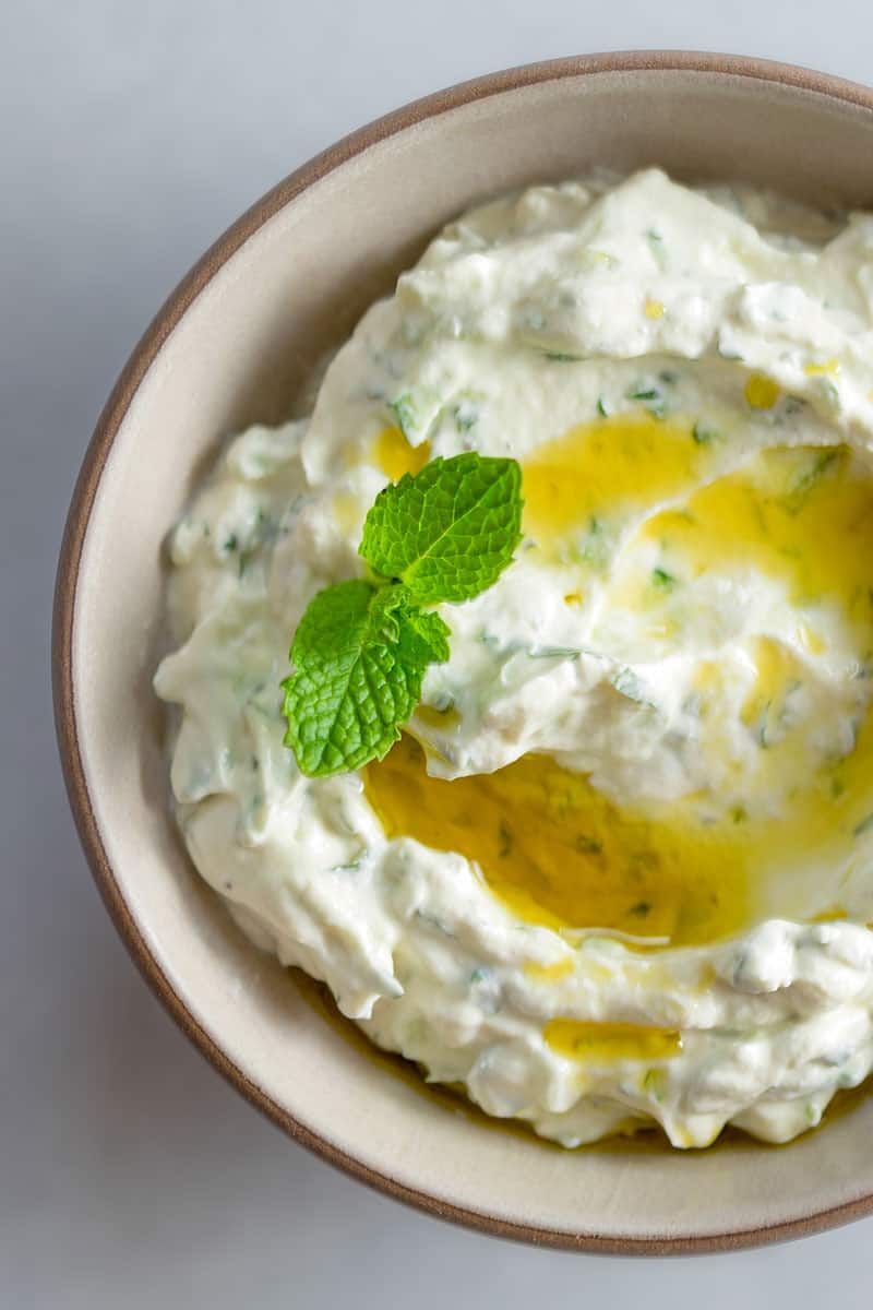 An overhead shot of a bowl of low carb and keto vegan tzatziki sauce.