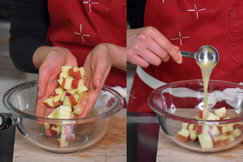 Placing chopped apples and lemon juice into a clear bowl.