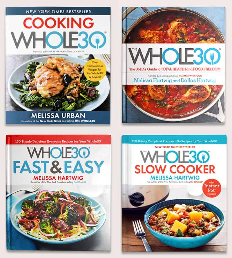 An overhead shot of 4 Whole30 cookbooks. 