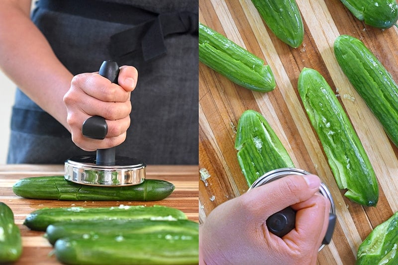 Smashing salt covered cucumbers.