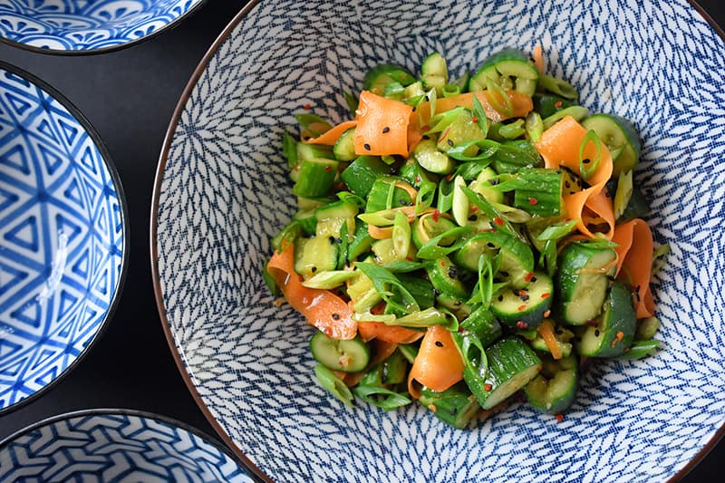 An overhead shot of paleo and whole30 smashed cucumber and carrot salad.