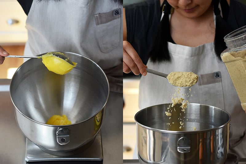 Adding ghee and maple sugar to the bowl of a stand mixer.