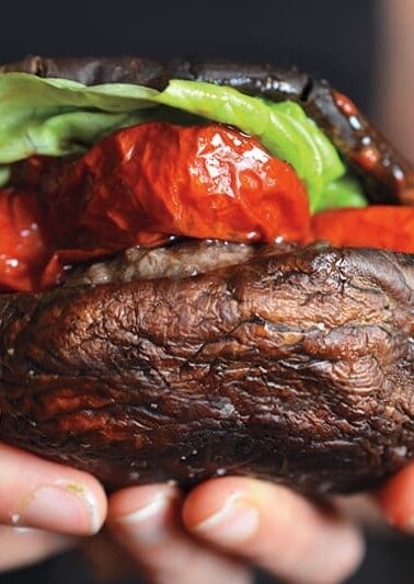 Roasted portobello mushrooms used as a hamburger bun!