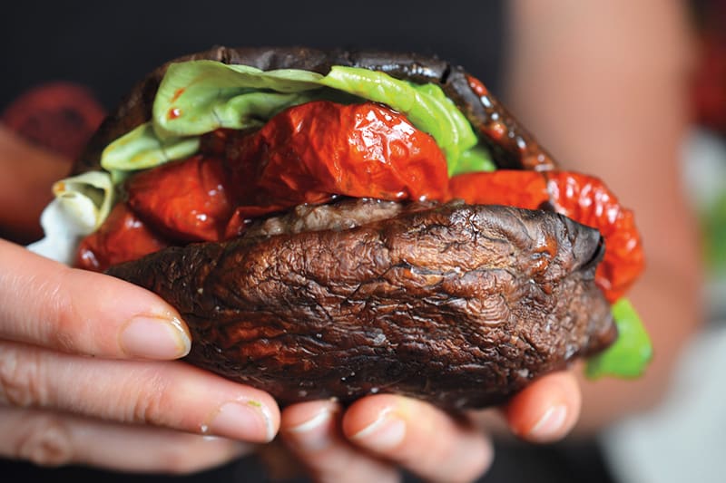 Roasted portobello mushrooms used as a hamburger bun! 