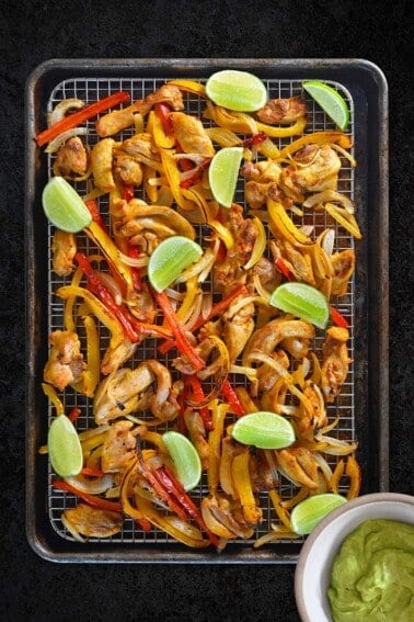 Sheet Pan Chicken Fajitas + Avocado Crema by Michelle Tam / Nom Nom Paleo https://nomnompaleo.com
