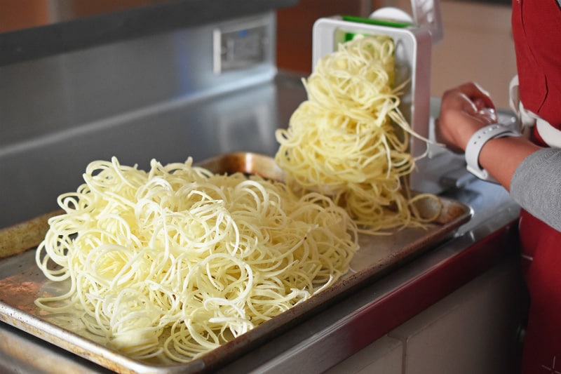 Spiralized white sweet potatoes for Crispy Swoodles with Bacon.
