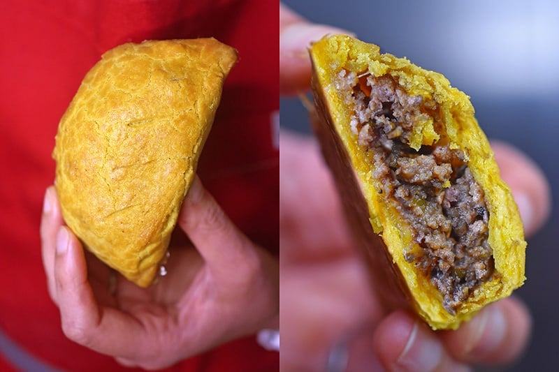 A Paleo Curried Meat Pie with a big bite taken out of it