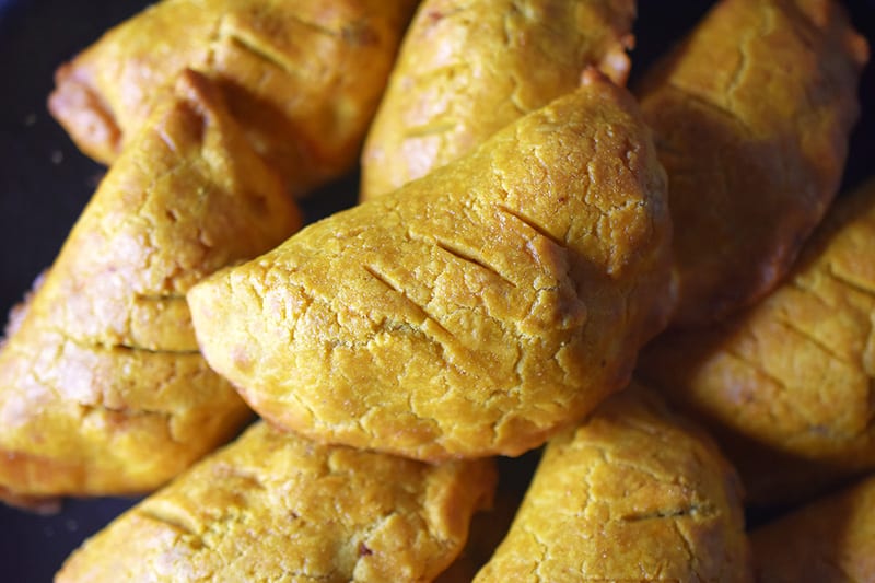 A side shot of a plate filled with Paleo Curried Meat Pies 
