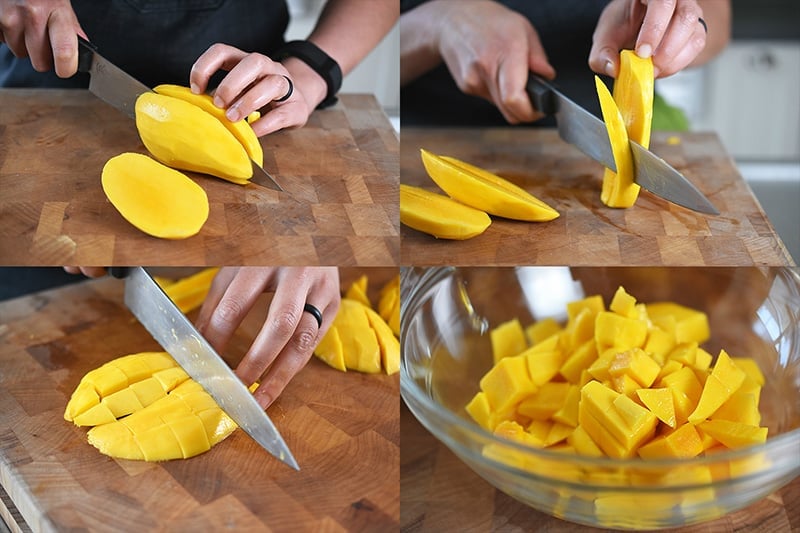 Chopping mango into bite sized pieces and placed into a bowl for the paleo and Whole30 recipe of fried green plantains and mango avocado salsa.