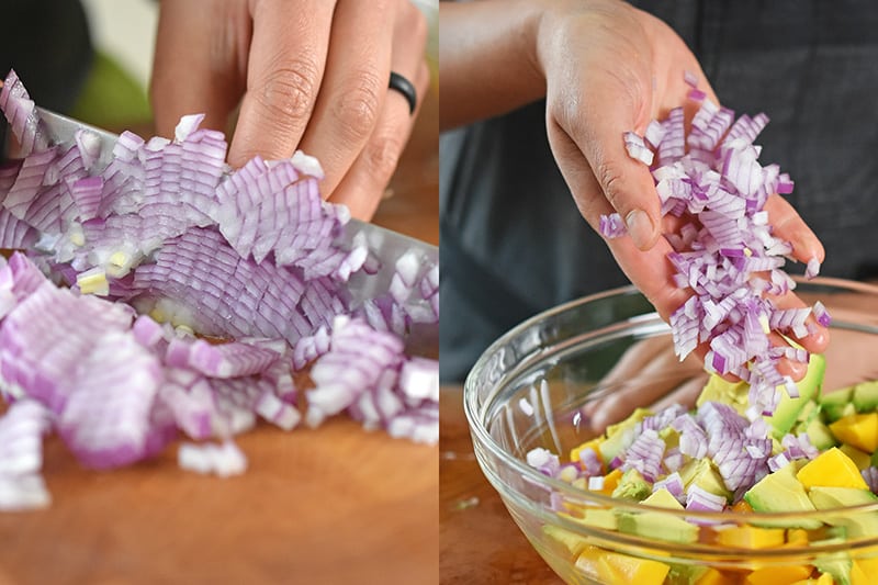 Finely diced red onion is placed into a bowl with avocado and mango for the paleo and Whole30 recipe of fried green plantains and mango avocado salsa.