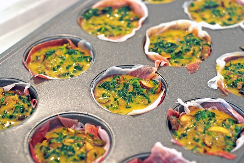 Prosciutto-Wrapped Mini Frittata Egg Muffins ready for the oven.