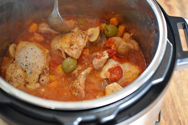 An open Instant Pot filled with Whole30 Summer Italian Chicken stew.