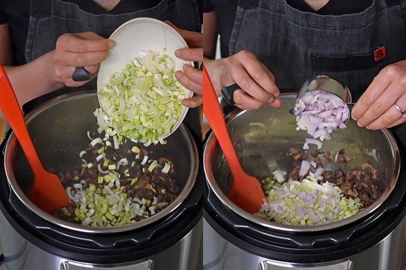 Someone tossing in diced leeks and shallots into the Instant Pot.