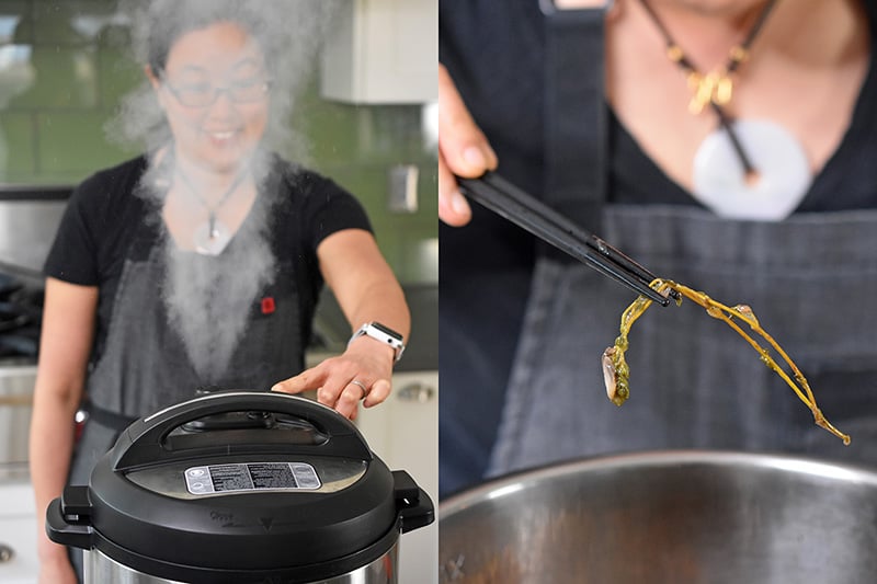 Someone manually releasing the Instant Pot and taking our the thyme sprig.