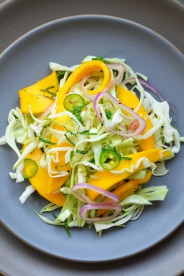 Spicy Mango Cabbage Slaw by Michelle Tam https://nomnompaleo.com