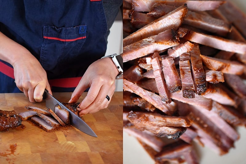 Someone slicing paleo char siu into thin strips.