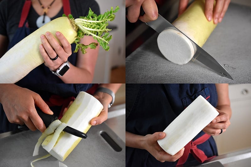 Someone peeling and preparing a daikon to get spiralized.