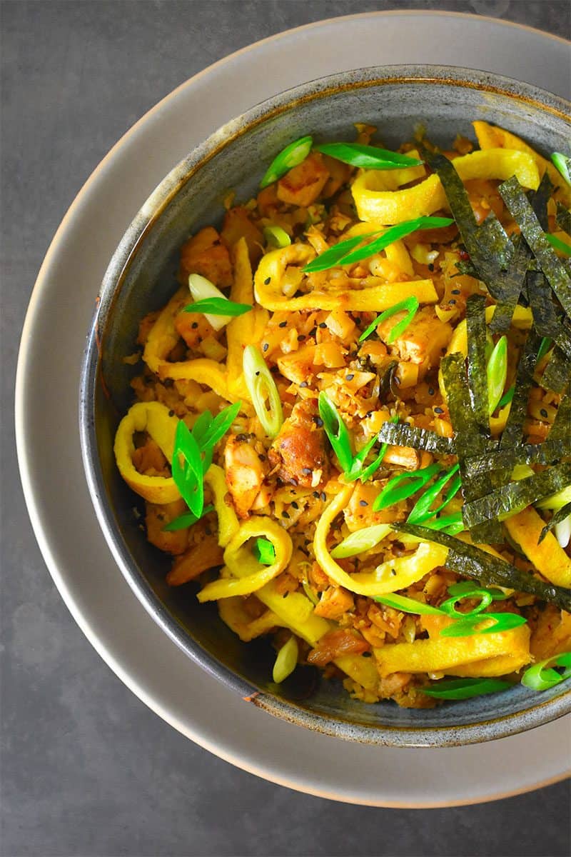 An overhead shot of a bowl of Kimchi Cauliflower Fried Rice