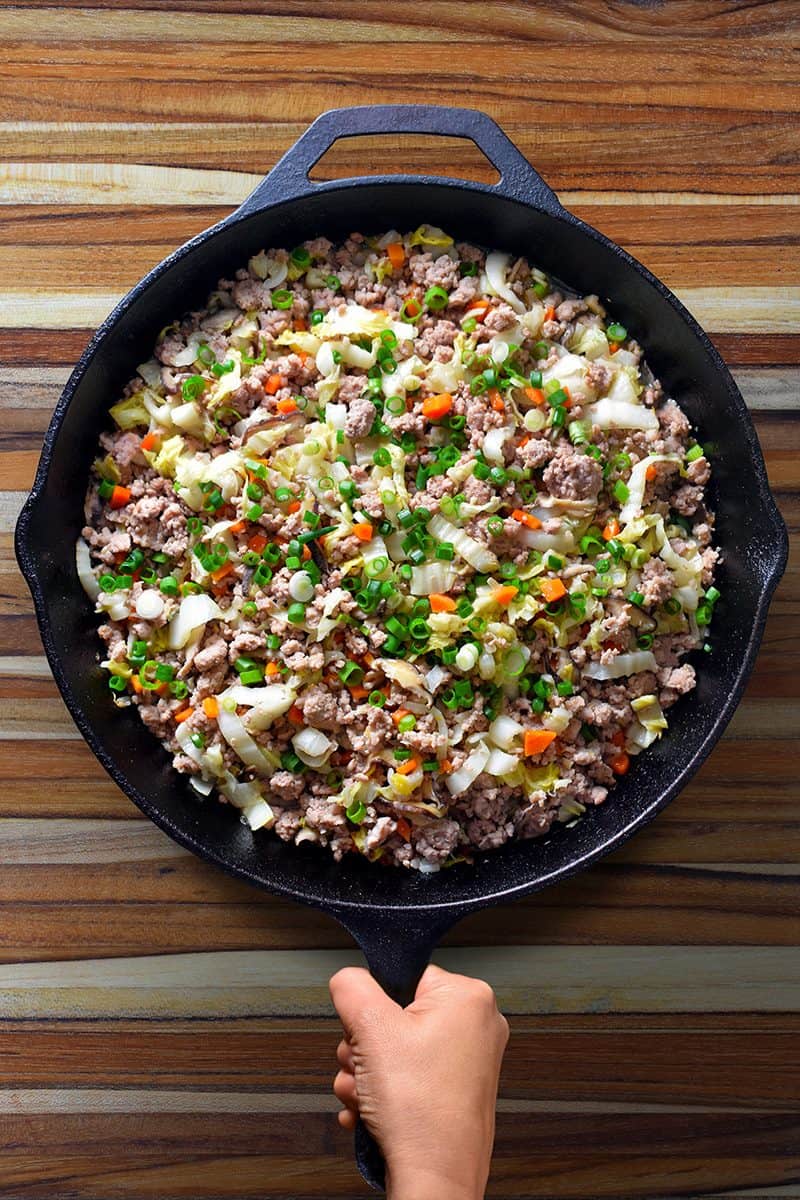 An overhead shot of a frying pan filled with Potsticker Stir-Fry
