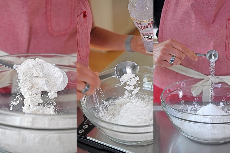 Measuring out the dry ingredients for Paleo Scallion Pancakes and putting them in a large glass bowl.
