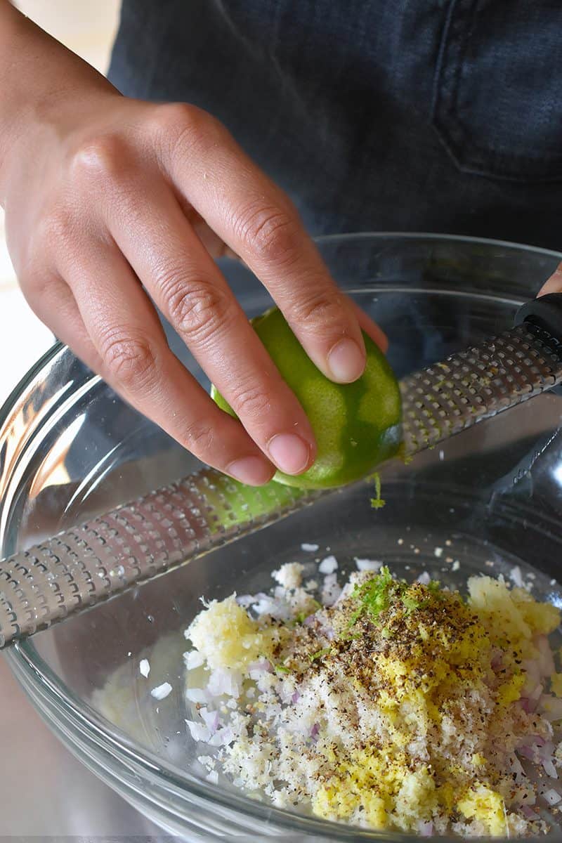 Zesting a lime for the Vietnamese Lemongrass Chicken marinade
