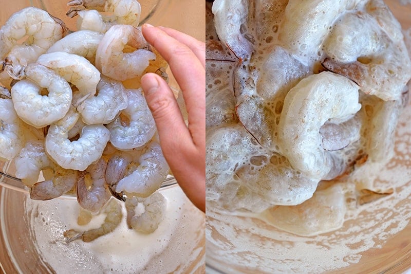 Adding the raw shrimp to the bowl of batter to make Paleo Walnut Shrimp.