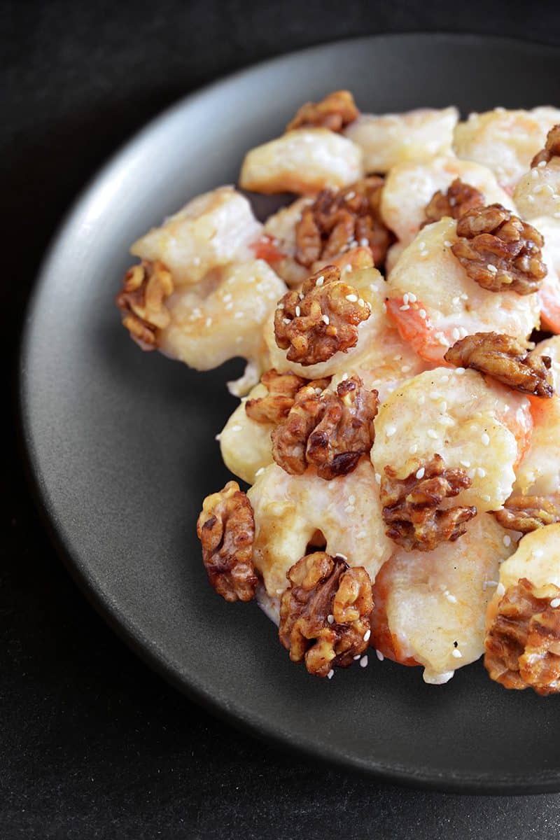 A black plate topped with Paleo Walnut Shrimp 