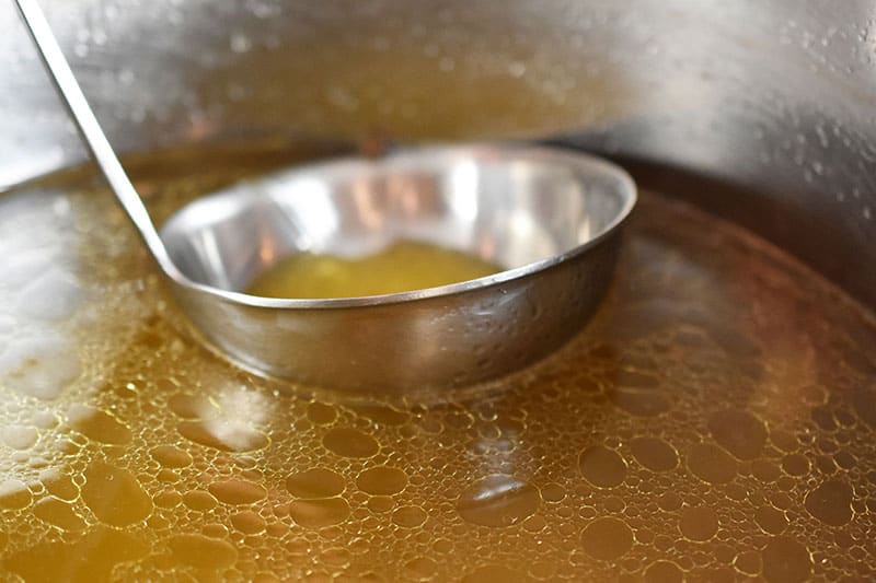 Skimming the fat off the top of Instant Pot (Pressure Cooker) Chicken Pho broth