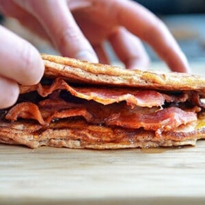 A side view of a Bacon Pancake Sandwich