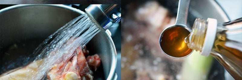 Adding water and some vinegar to a pressure cooker filled with bones.